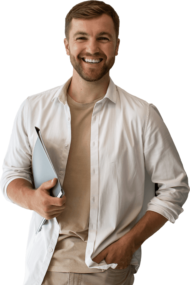 A male attendant holding a tablet with a smile on his face.